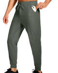 Man wearing loose-fit solid colour casual trousers made from polyester fabric.