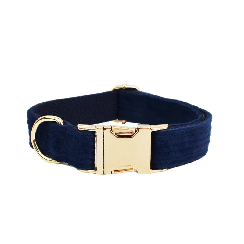 Navy blue corduroy dog collar and leash set with matching vest, poop bag, and decorative bow