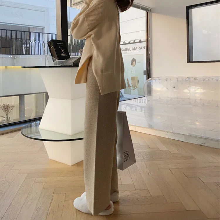 Women's high-waist knitted wide-leg trousers in cream white, floor-length design for winter wear
