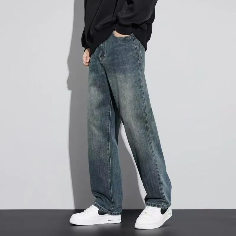 Retro straight-leg jeans for men in light blue cotton denim on a neutral background.