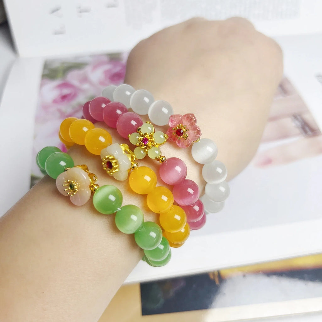 Handmade glass beaded bracelet with floral design in yellow, pink, white or green colour options