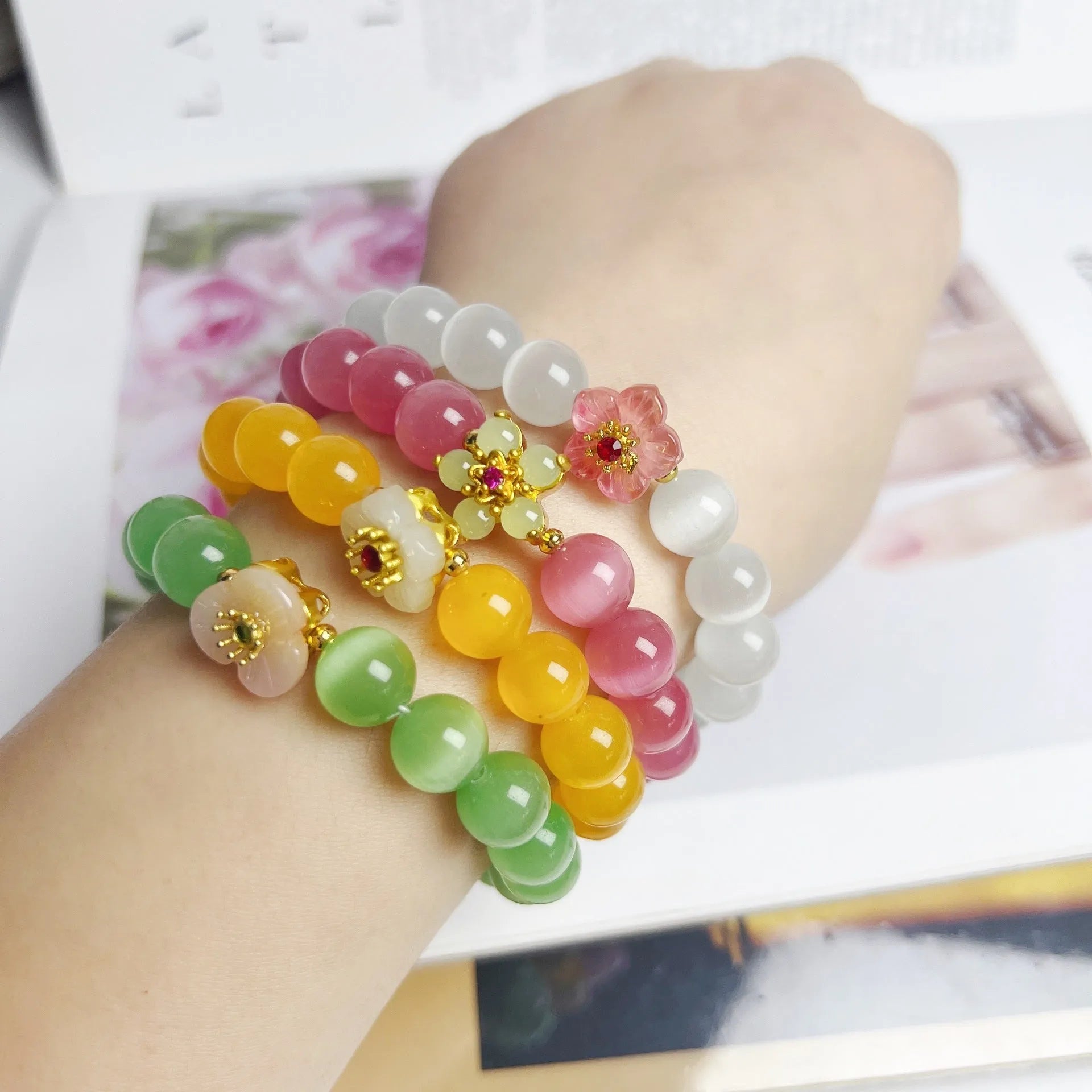 Handmade glass beaded bracelet with floral design in yellow, pink, white or green colour options