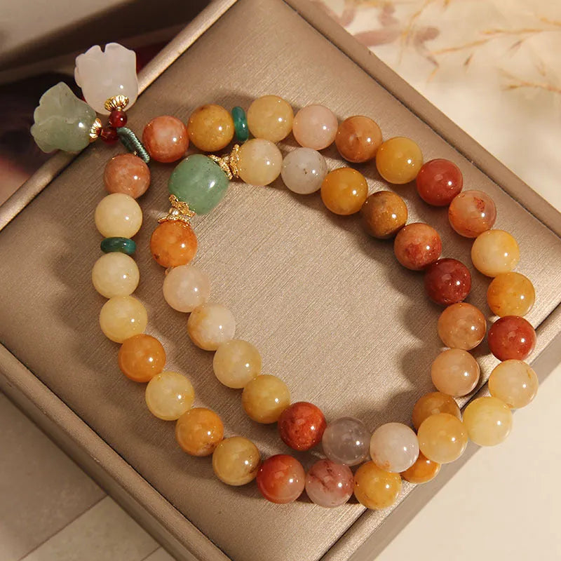 Natural Jinsi Jade multi-layer women's bracelet with adjustable cord tie closure and orchid pendant