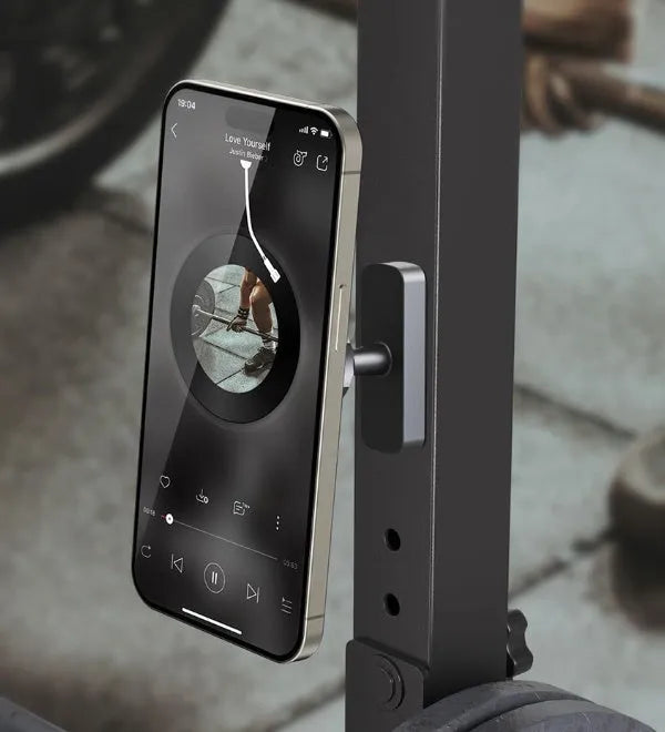 Silicone rubber magnetic suction phone bracket holder for iron surfaces in cars and gyms.