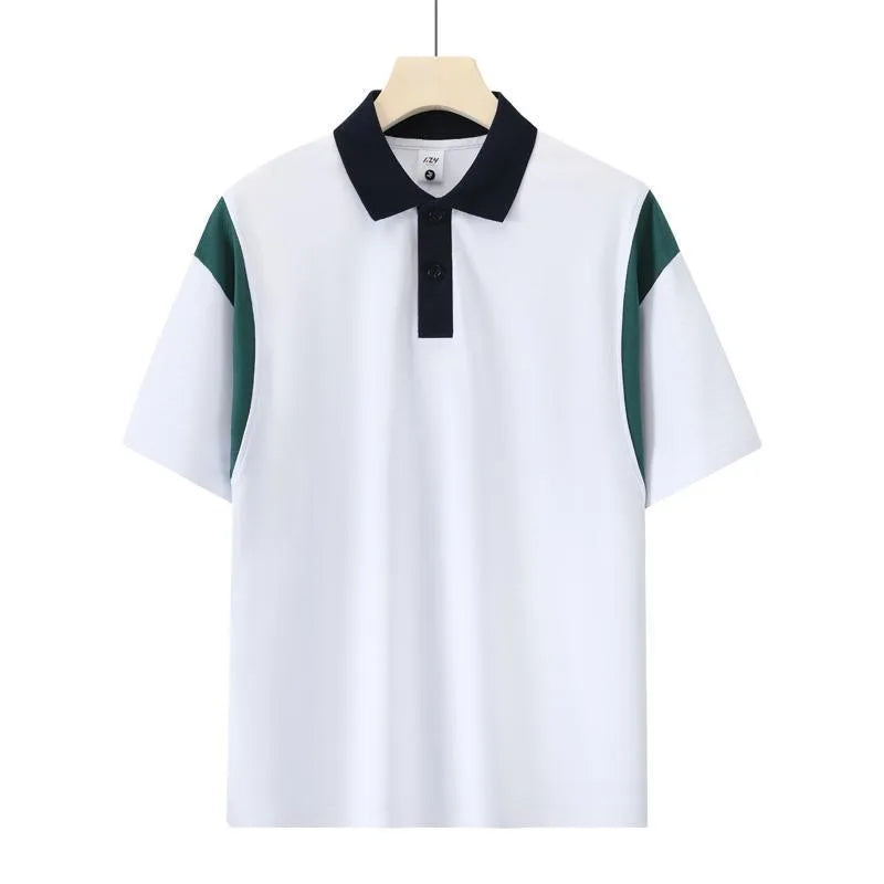 Man wearing a black raglan sleeve short sleeve t-shirt with a loose fit.