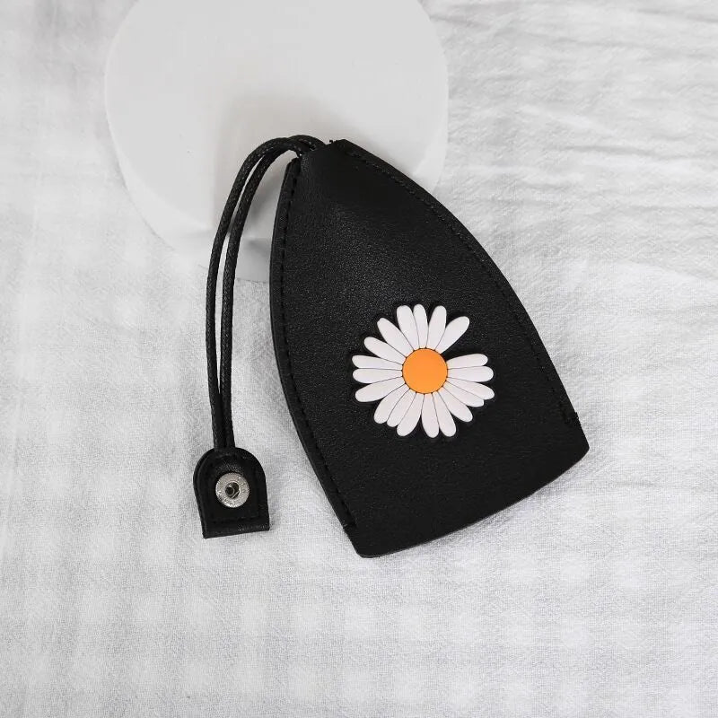 Colourful cartoon PU leather pull-out key case for car keys, shown open and closed
