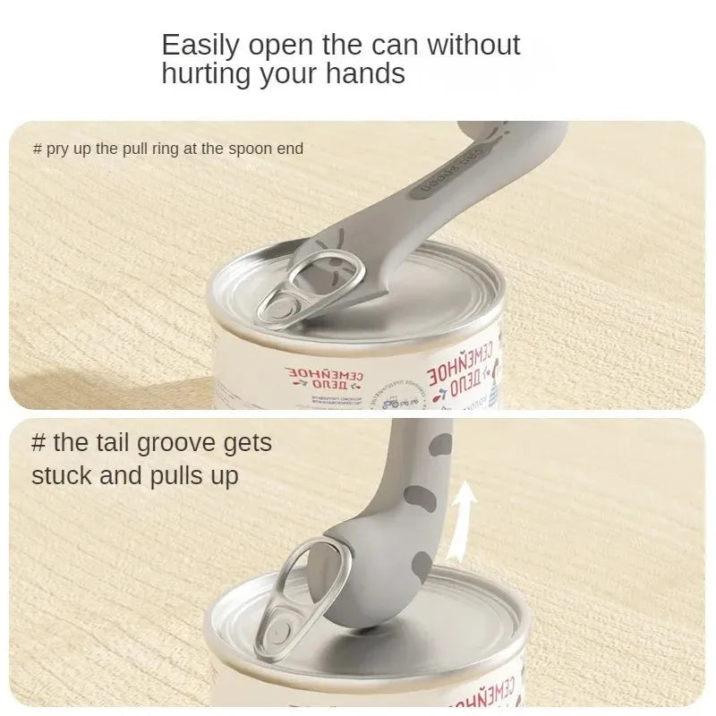 Grey silicone pet food spoon with integrated can opener and matching sealing lid for tins.