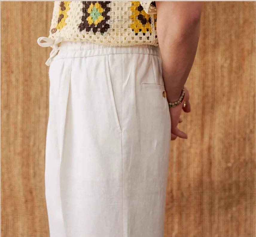 Linen high waist straight-leg trousers with elasticated waistband in greige colour.