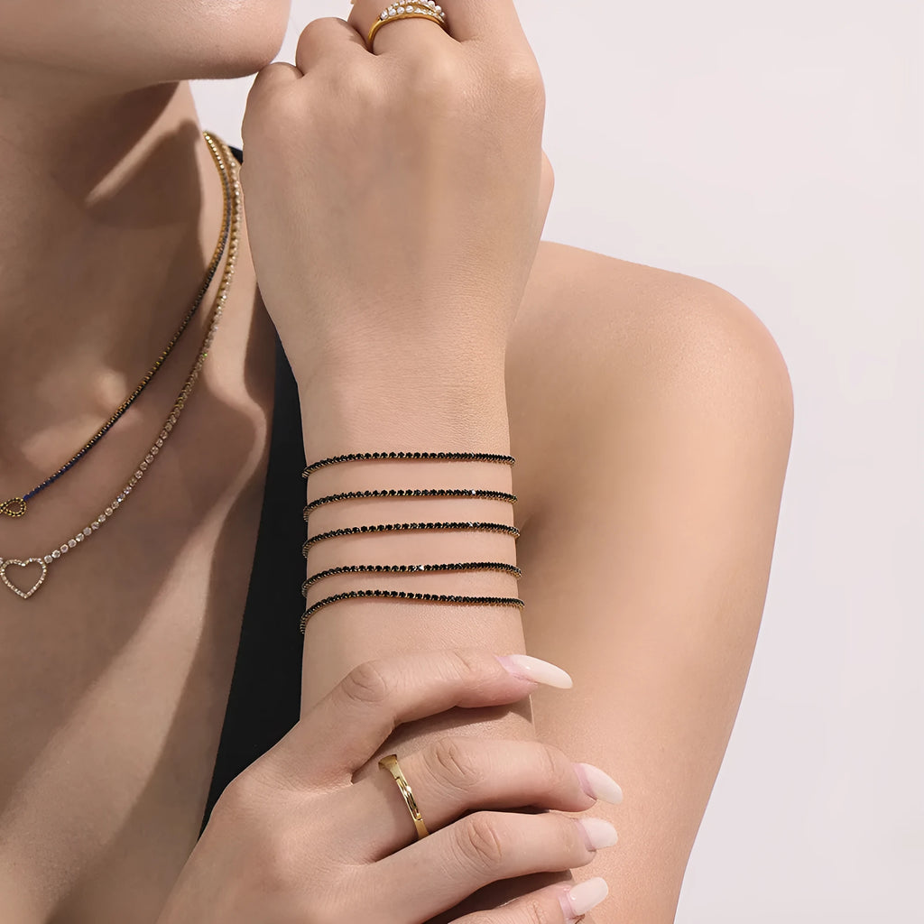 Titanium steel geometric full diamond-cut ring bracelet with white zircon accents on neutral background