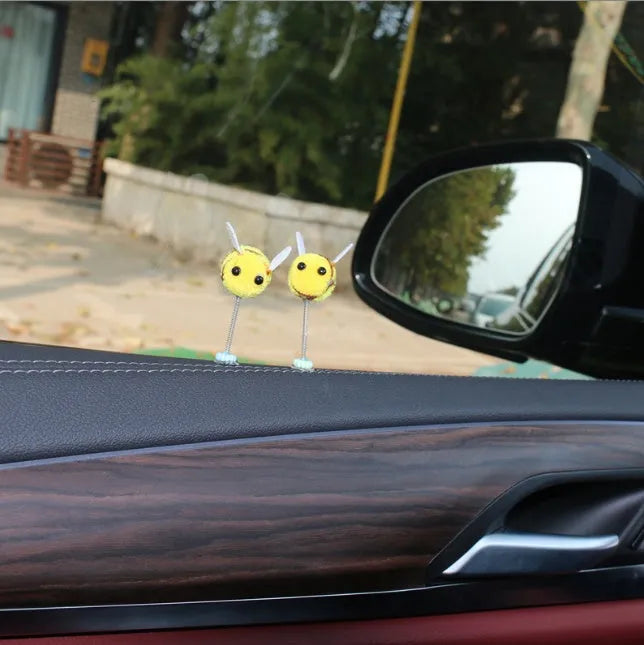 Swing Spring Bee car decoration with fur ball material and cartoon design measuring 3x3 cm
