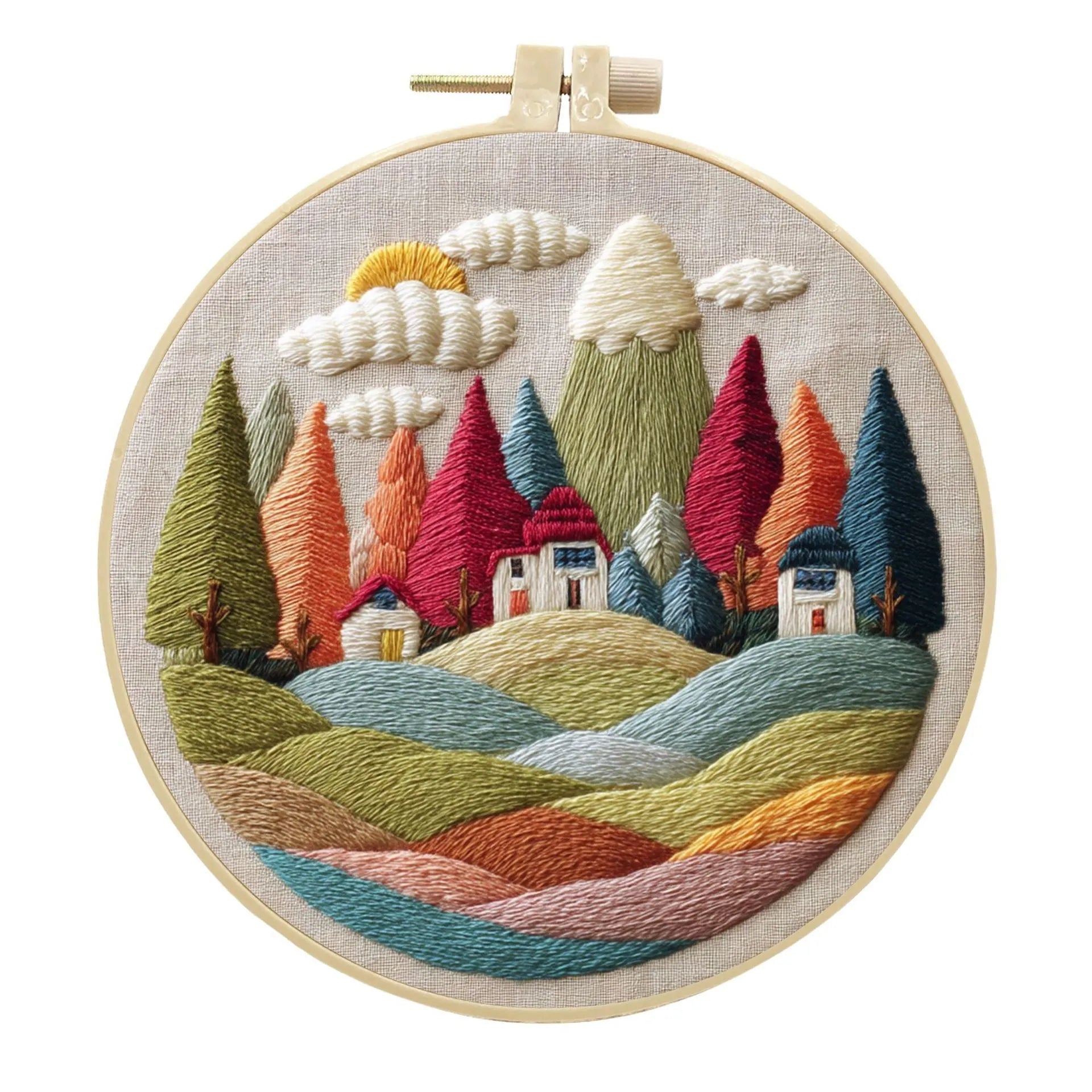 Embroidery DIY kit with landscape designs on cotton fabric, bamboo frame, thread, and needles
