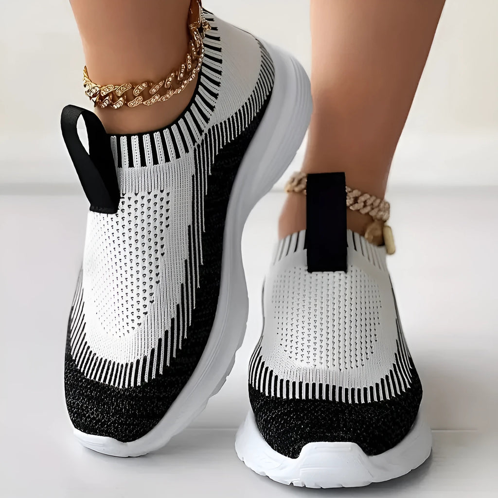 Women's casual sports shoes with breathable mesh upper in solid colour, side view