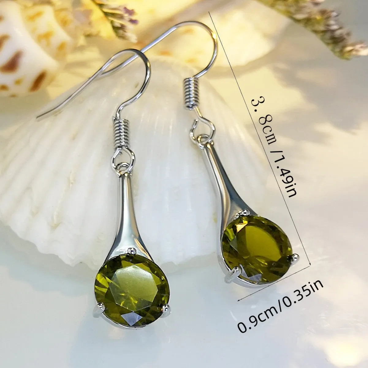Olive green topaz colour earrings with water drop shape and retro style design