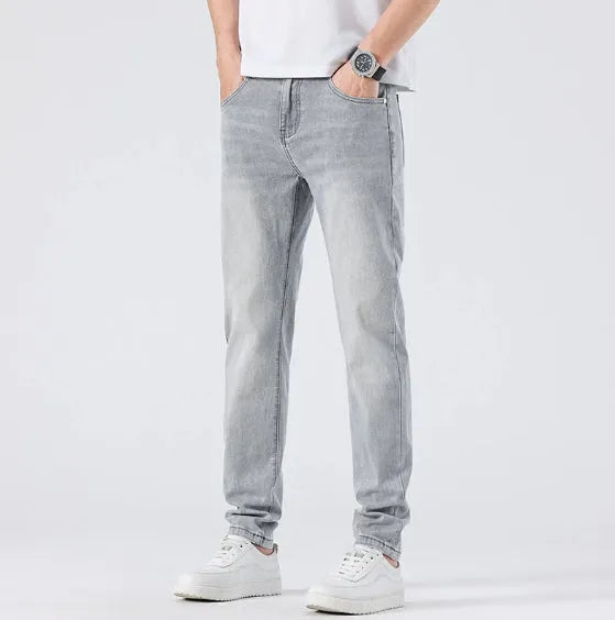 Men's light wash slim straight leg jeans in light grey cotton with no-iron finish