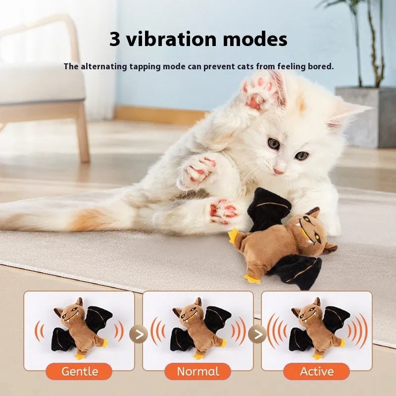 Rechargeable cat plush toy with swing wings in Halloween bat style on a light background