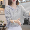 Women's loose grey crochet hollow hooded longsuit undershirt with long sleeves.