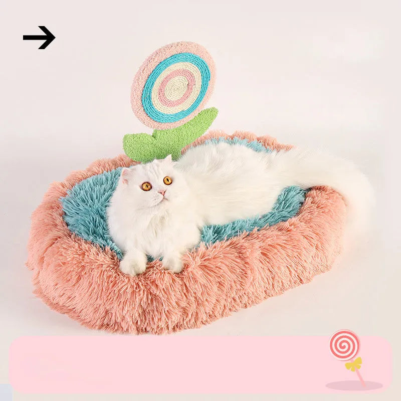 Pink elliptical lollipop-shaped plush cat bed with a removable cover.