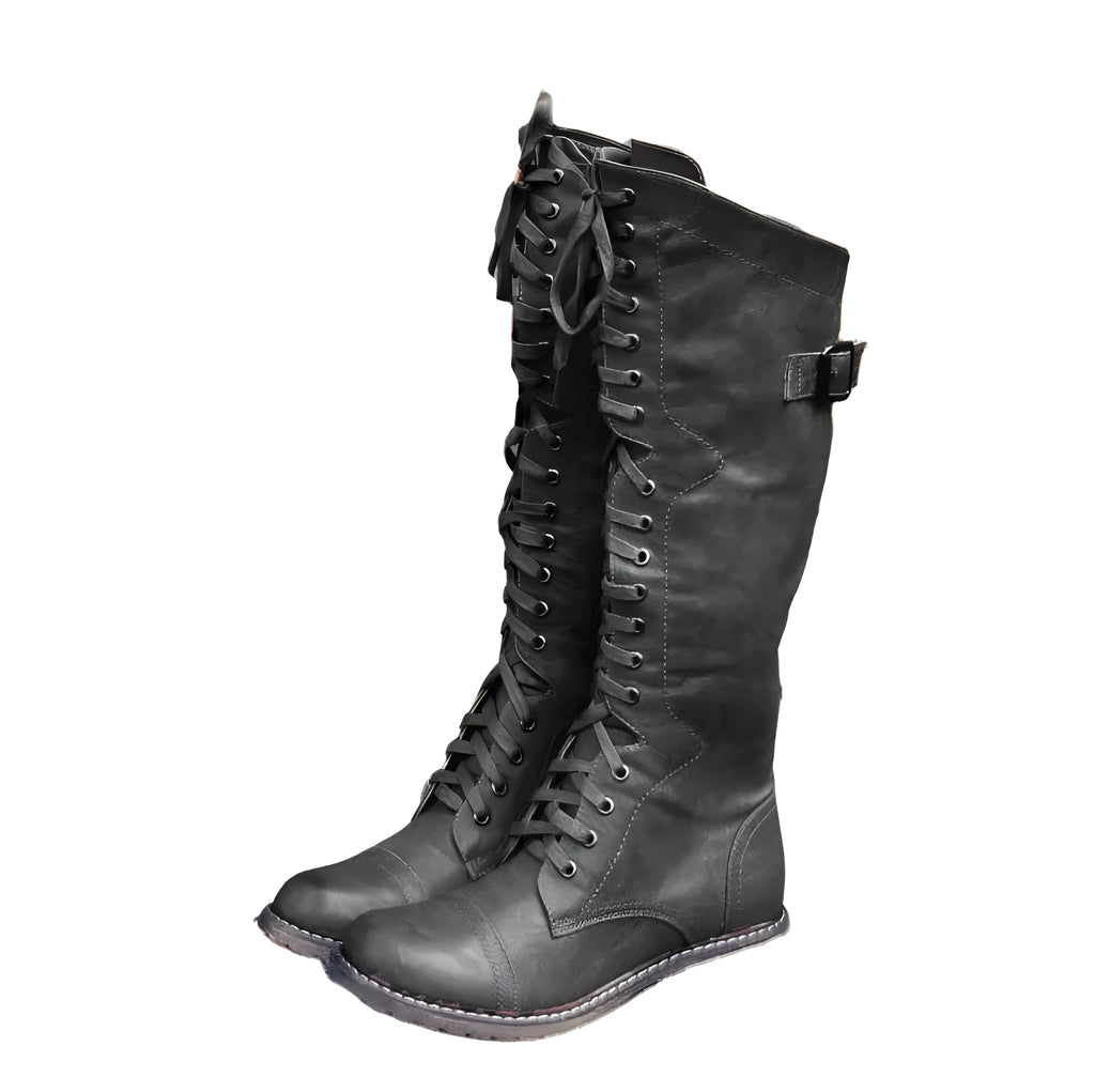 Women's black cross strap knight boots with zip closure in artificial PU material