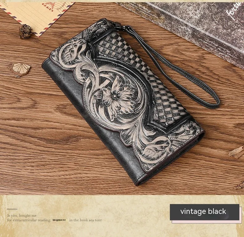 Retro brown women's tri-fold wallet with deep embossed floral pattern, shown open to reveal compartments.
