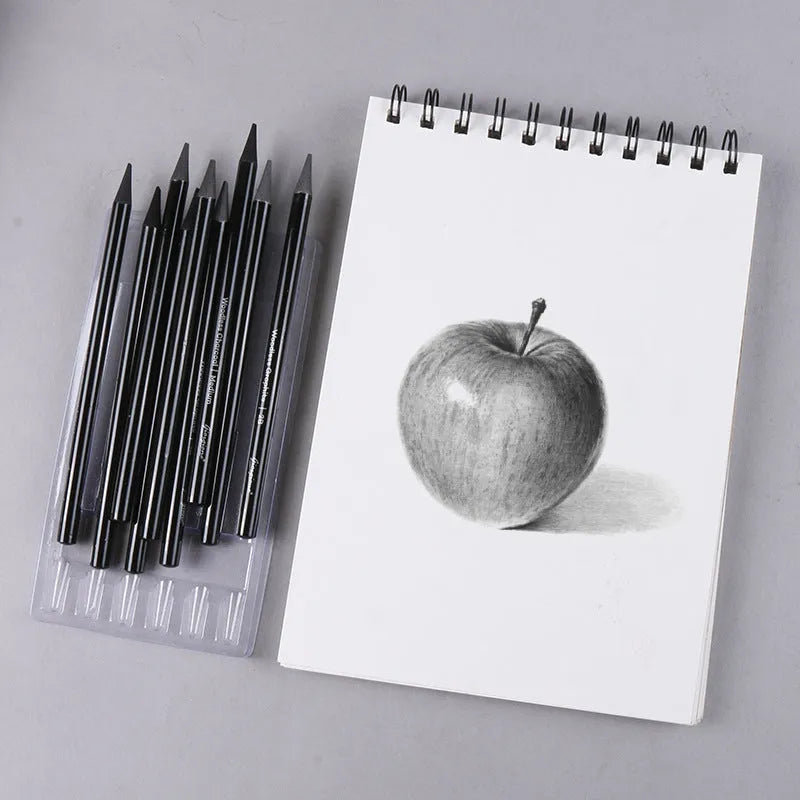 Set of nine wooden drawing pencils, six graphite and three carbonized, on a suction card.