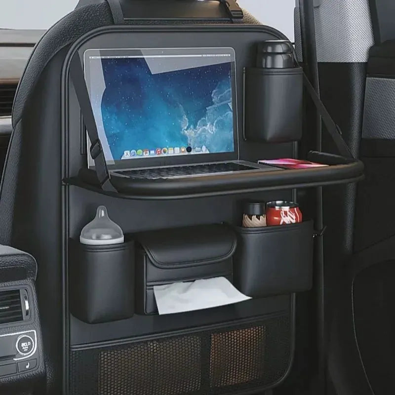 Black PU leather car seat storage bag with foldable table tray attached to a car back seat