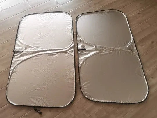 Titanium silver aluminium foil car sunshade folded, showing reflective surface and size options for windscreen heat protection.