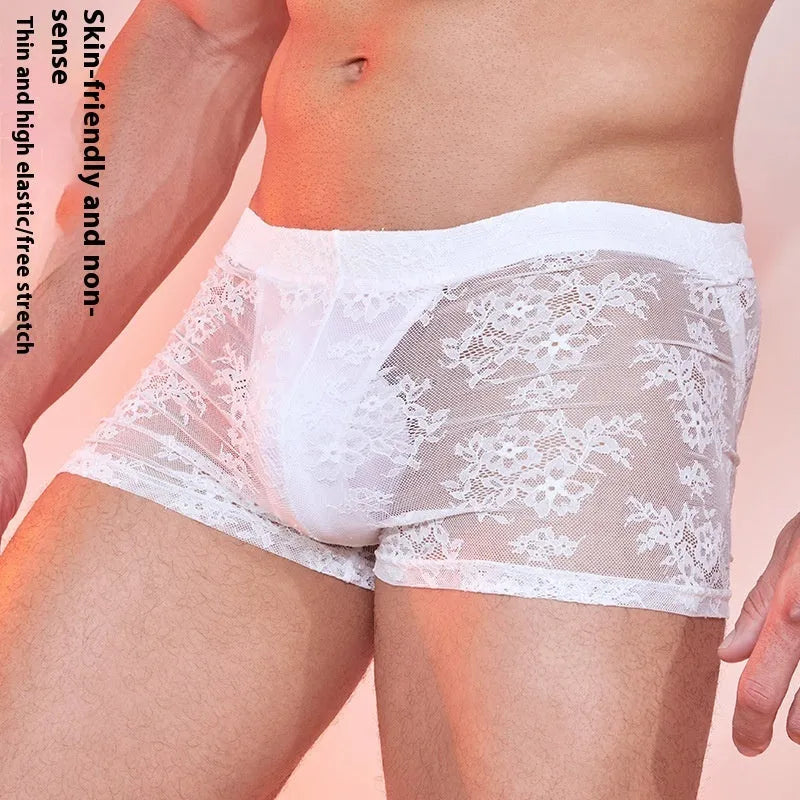 Men's black nylon boxers with white lace trim detail on the waistband.