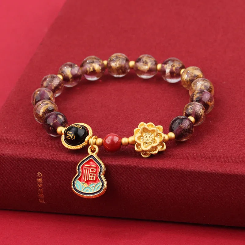 Lotus Blessing Card bracelet with 8mm glass beads, fragrant grey glaze, and gold foil electroplated accents