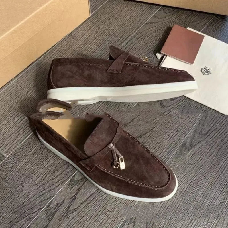 Lightweight unisex slip-on loafers with a round toe, rubber sole, and PU upper in a high-top design.