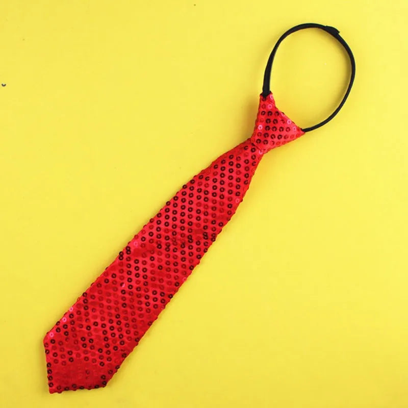Gold sequin clip-on bow tie with striped pattern on white background.