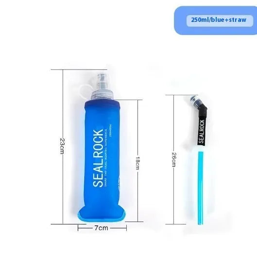 Flexible silicone drinking straw with black carabiner clip against outdoor background