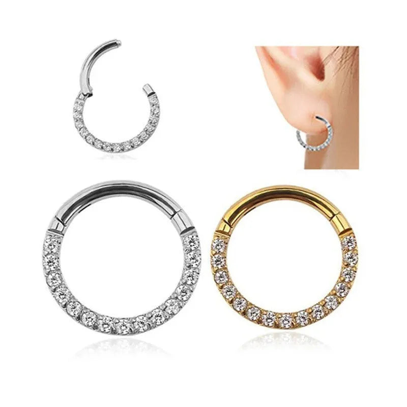 Seamless stainless steel nose ring with a central diamond decoration, shown in gold and rose gold finishes.