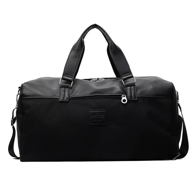 Large black Oxford cloth travel messenger bag with a 36-55 litre capacity shown on a shoulder.