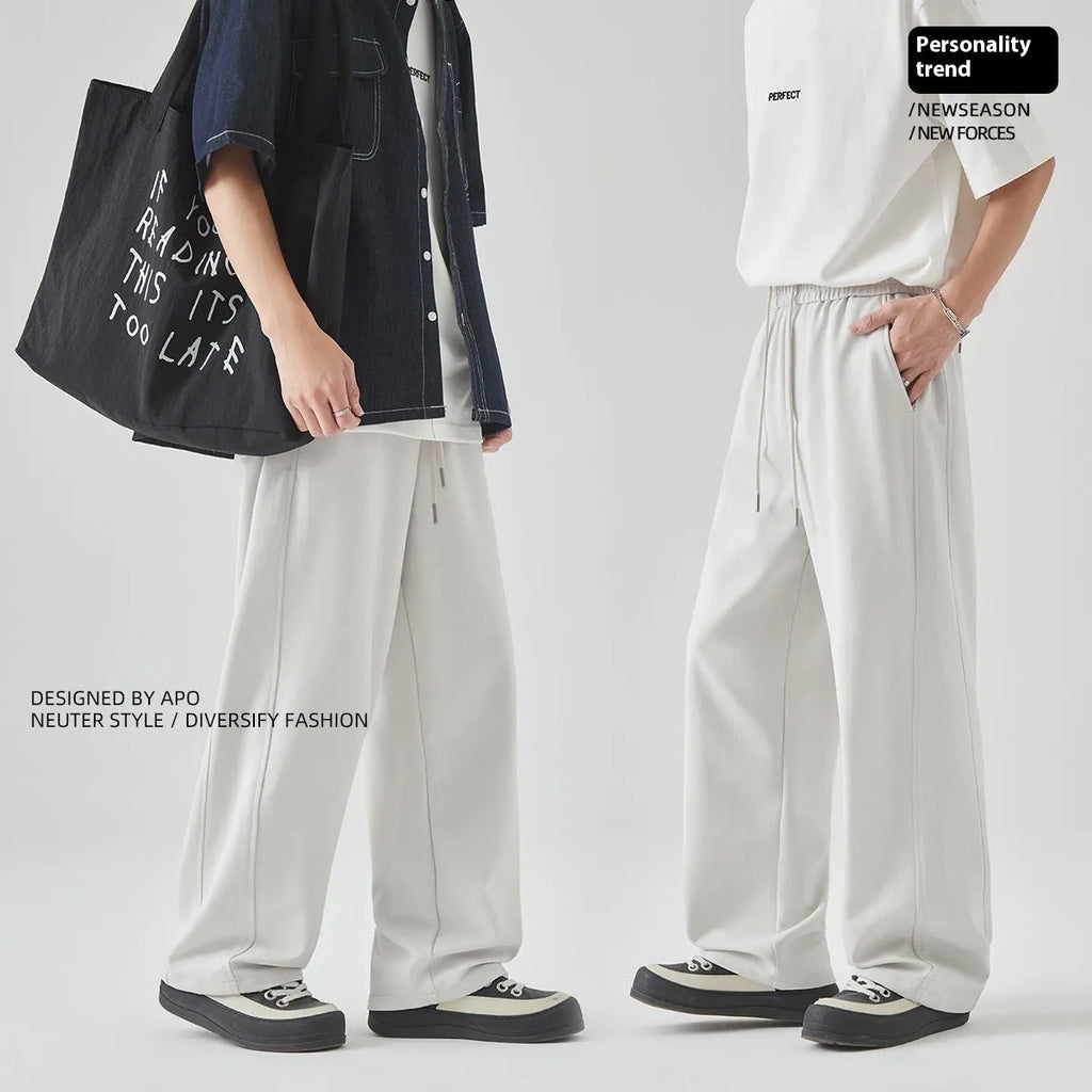 Men's grey cotton blend trousers with lace-up front and straight-leg fit