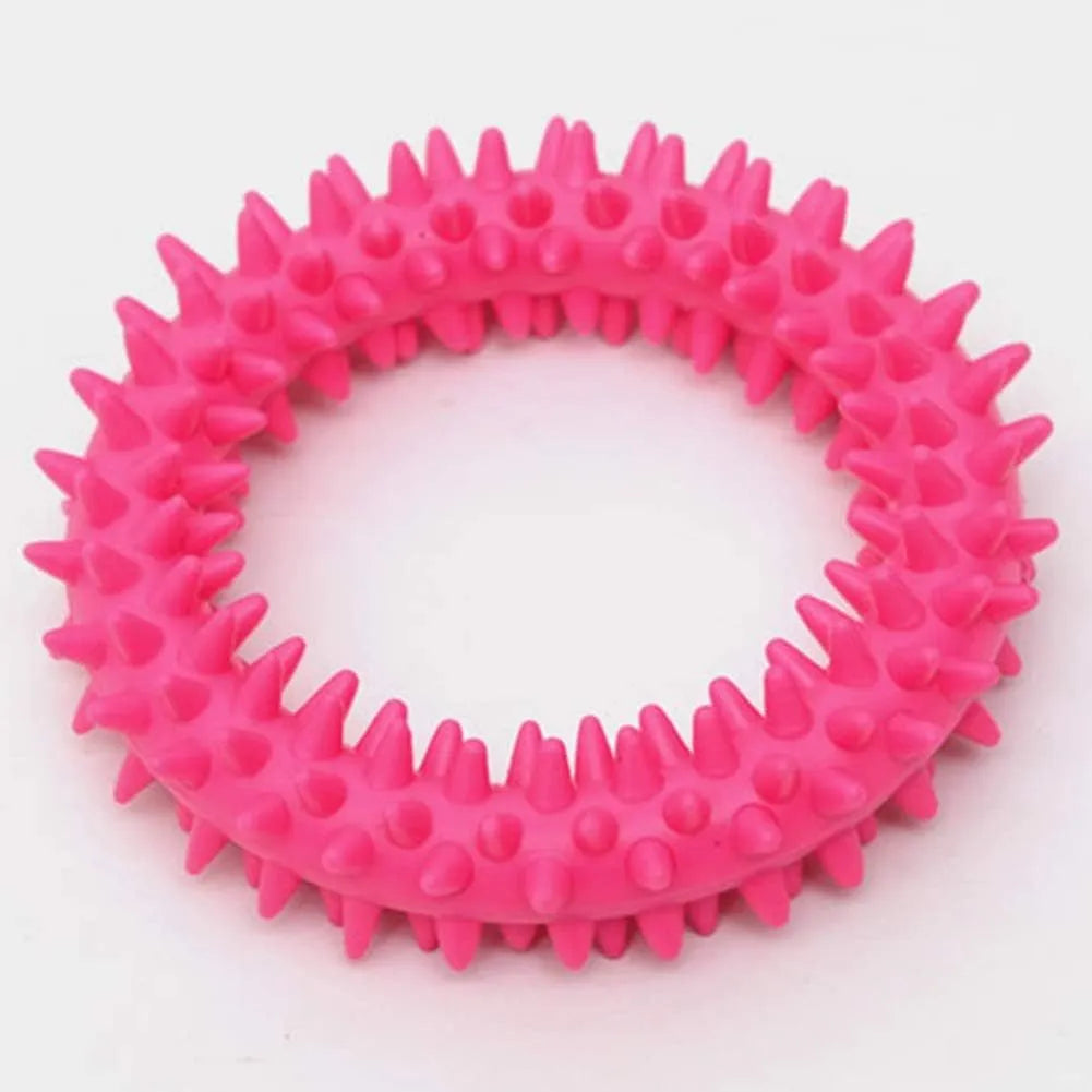 Blue TPR spiky circle ring dog chew toy for teeth cleaning on a white background.