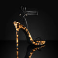 Women's leopard print Roman sandals with pointed toe and buckle fastening on rubber sole