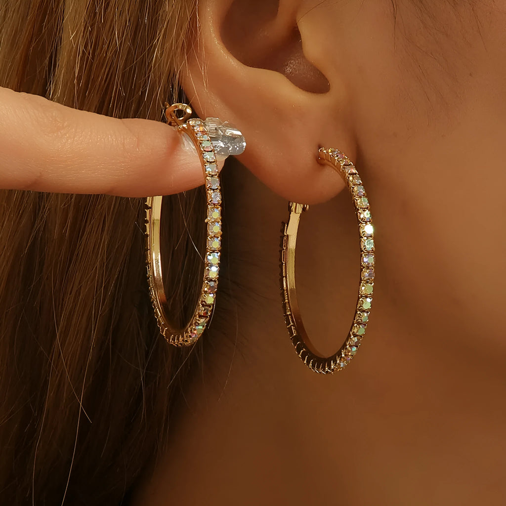 Large gold plated copper zircon hoop earrings for women, princess style, gold colour, on white background