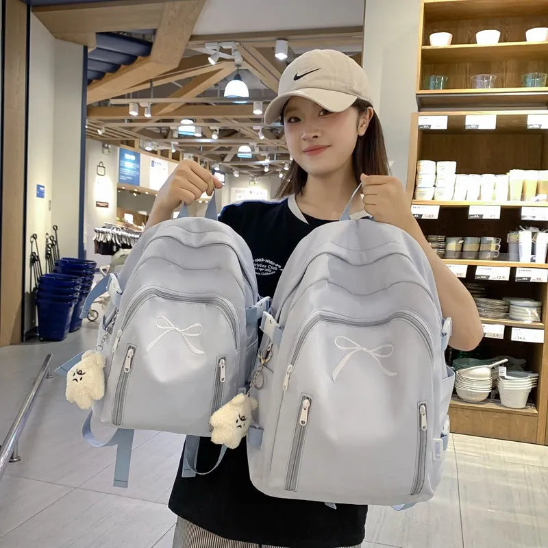 Nylon bow backpack large capacity 36-55L solid colour college style ultra light for women black blue pink white yellow