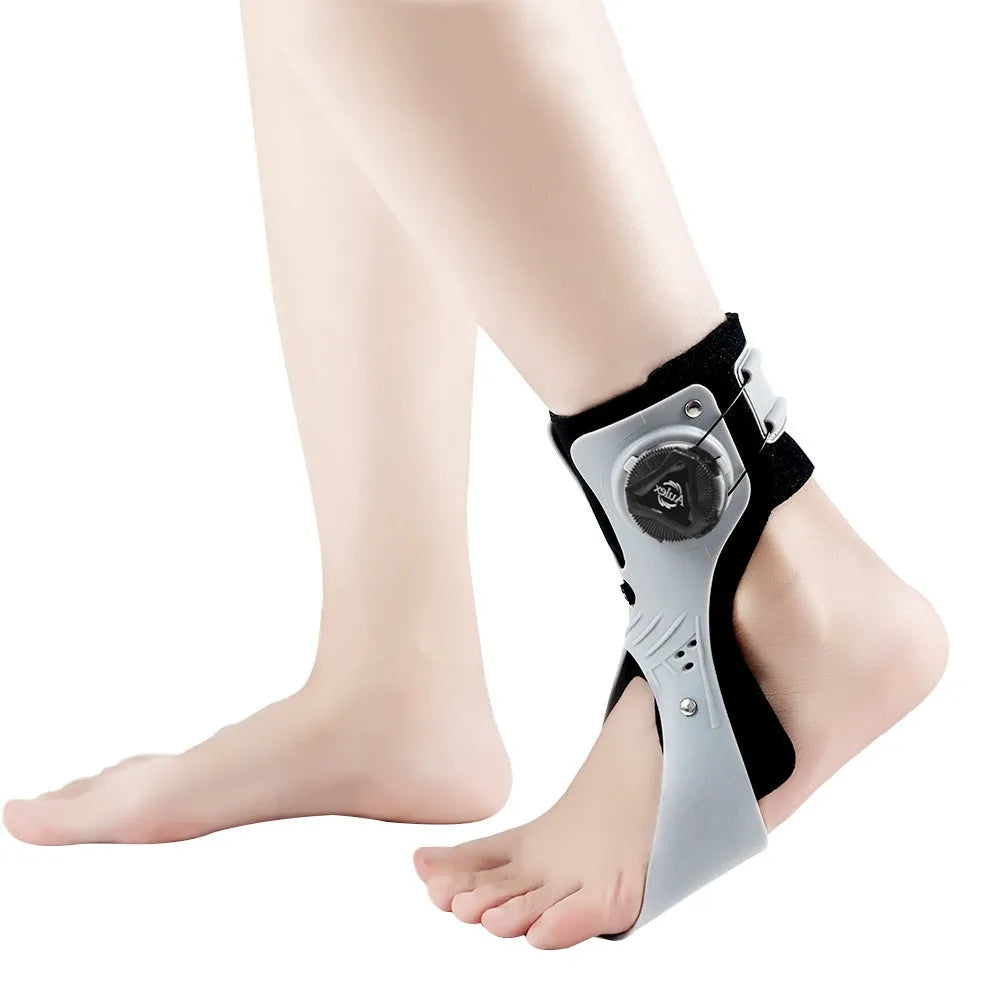 Grey ankle support brace with airbag button system showing adjustable straps and sizing options