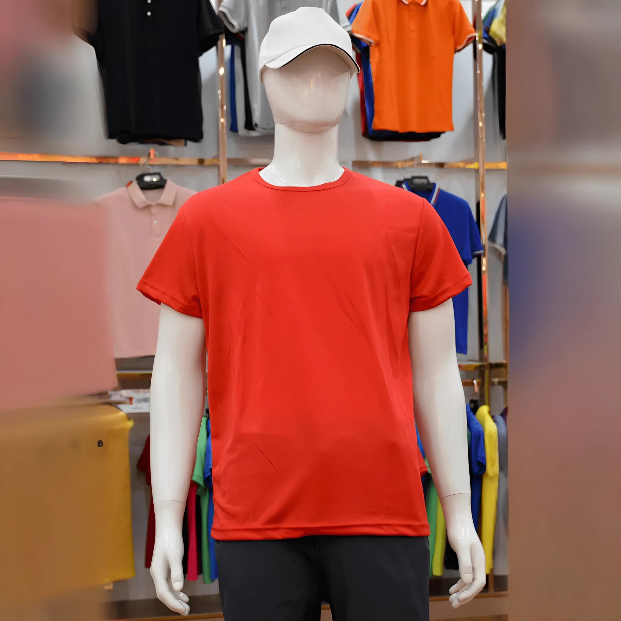 Man wearing a slim-fit quick-dry t-shirt in a solid colour, showing round neck and short sleeves.