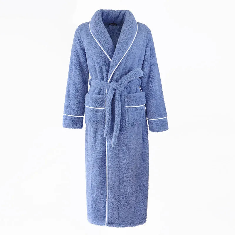 A man and woman wearing matching thick navy blue flannel bathrobes, ankle-length winter nightgown style.