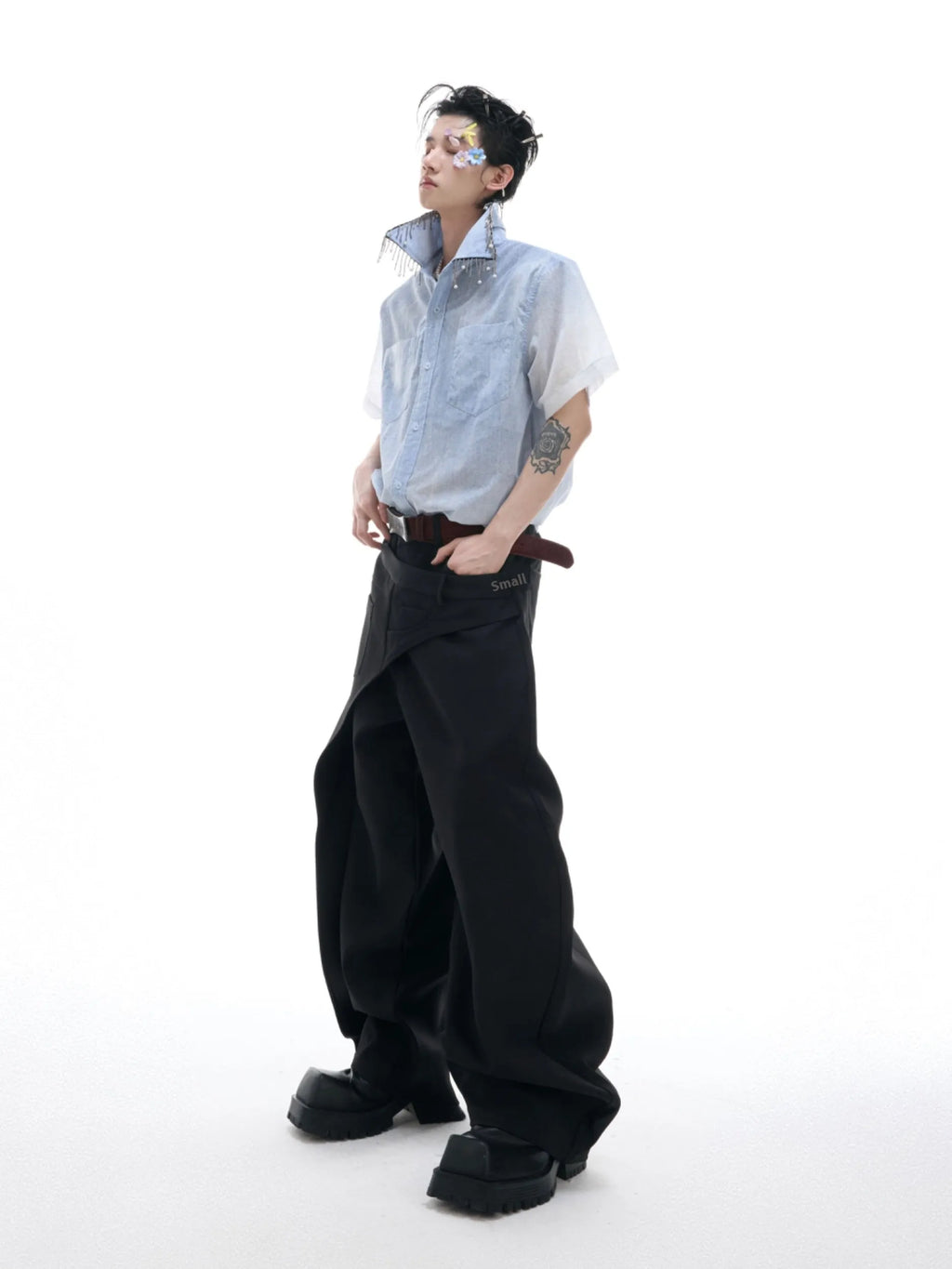Blue and white gradient short-sleeved loose-fit shirt on a hanger.