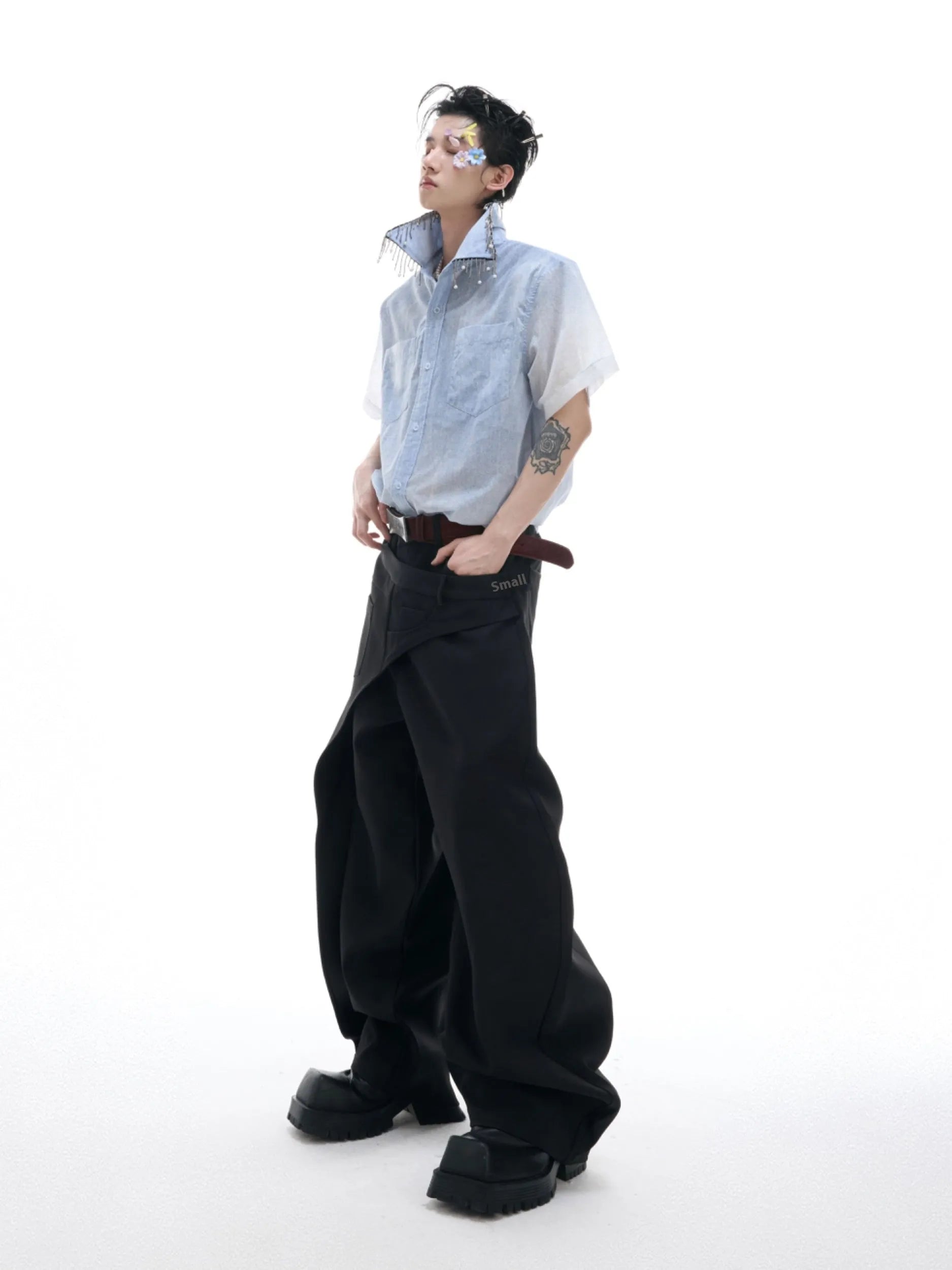 Blue and white gradient short-sleeved loose-fit shirt on a hanger.
