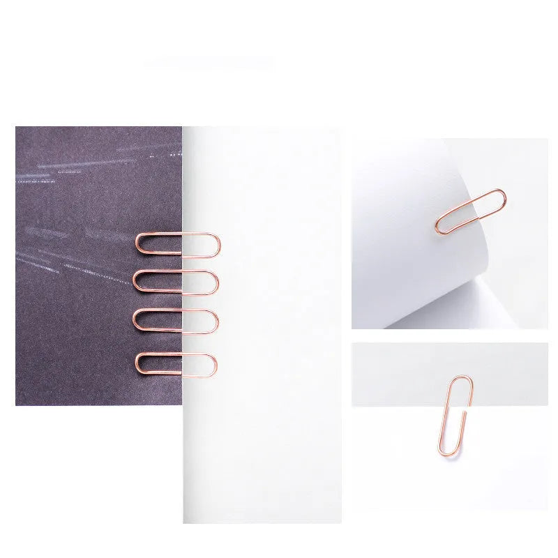 Rose gold coloured heart-shaped metal paper clips, pack of 100 pieces.