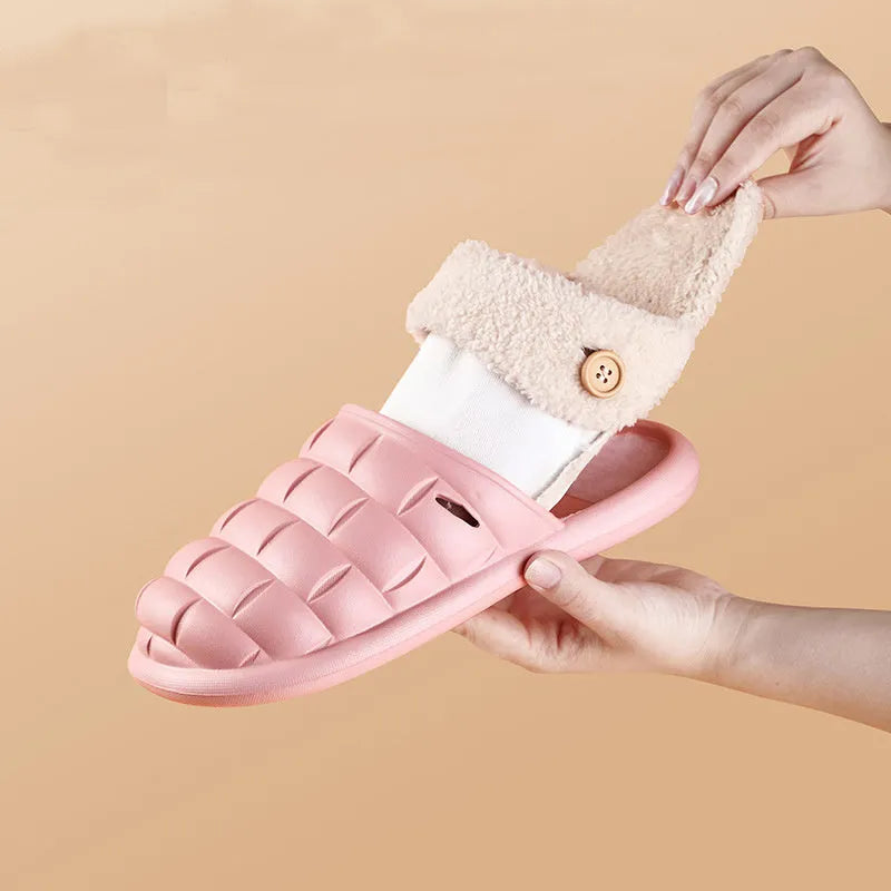 Women's pink detachable plush EVA winter house slippers with non-slip sole shown from the side.