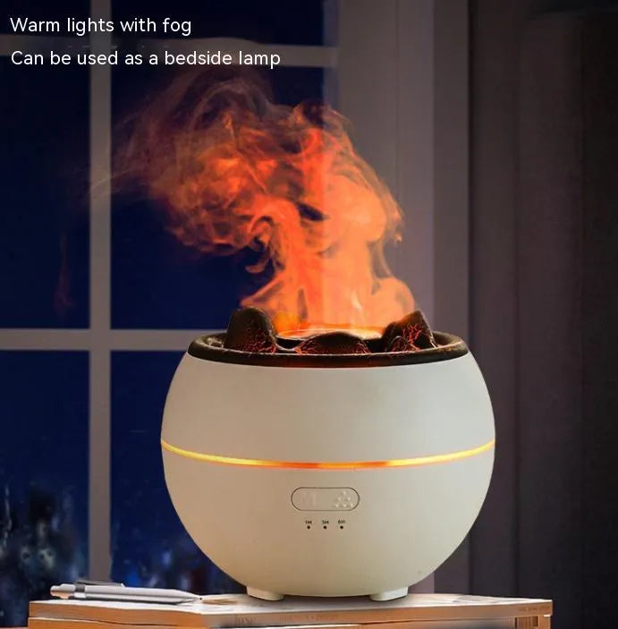 White crack-style flame aroma diffuser on a desk with mist and timer buttons visible
