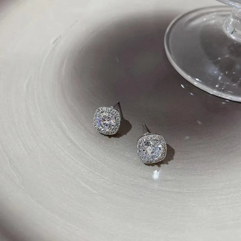 Square diamond geometric women's earrings in alloy metal, shown in silver and gold colour options.