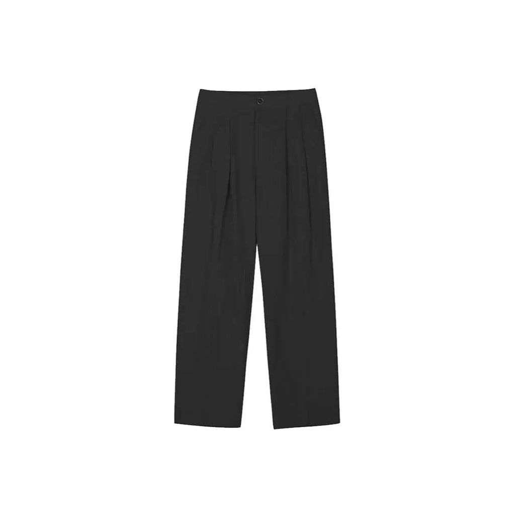 Men's apricot coloured loose-fit cotton linen suit trousers with a pencil leg on a neutral background.
