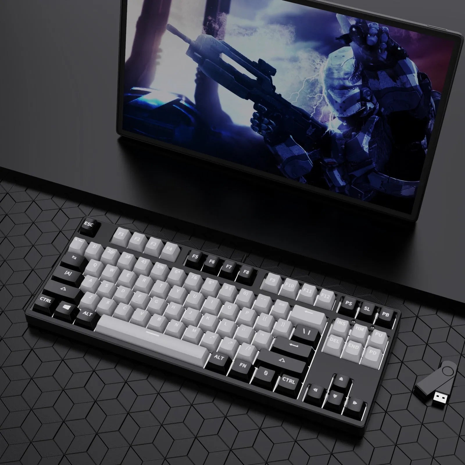 87-key hot-swappable mechanical keyboard with dual-colour backlighting and metal construction.