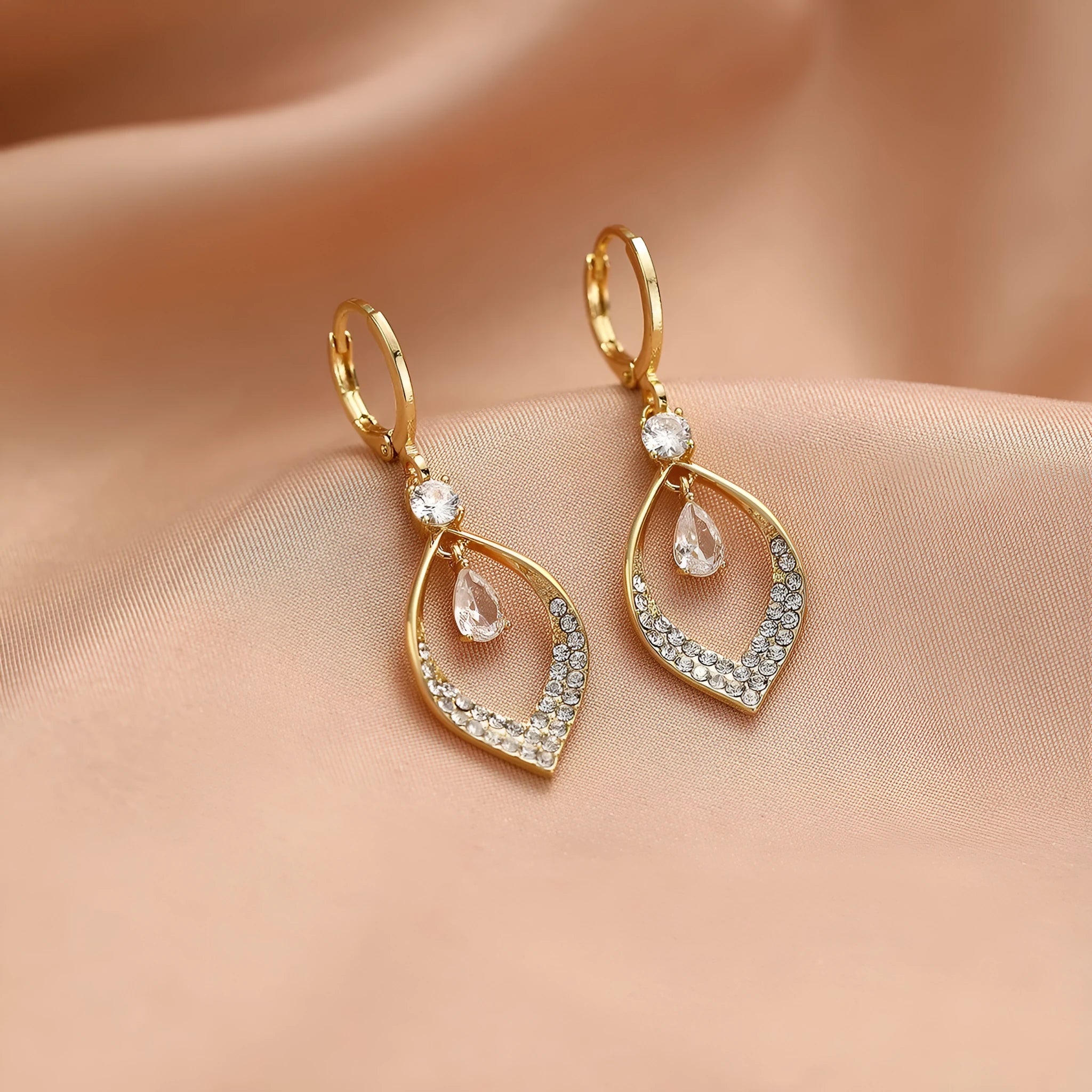 Teardrop-shaped water drop tassel earrings for women with a gold or silver electroplated finish.